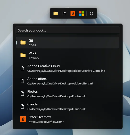 Anchor Search open beneath the dock, listing folders, shortcuts and a website that match.